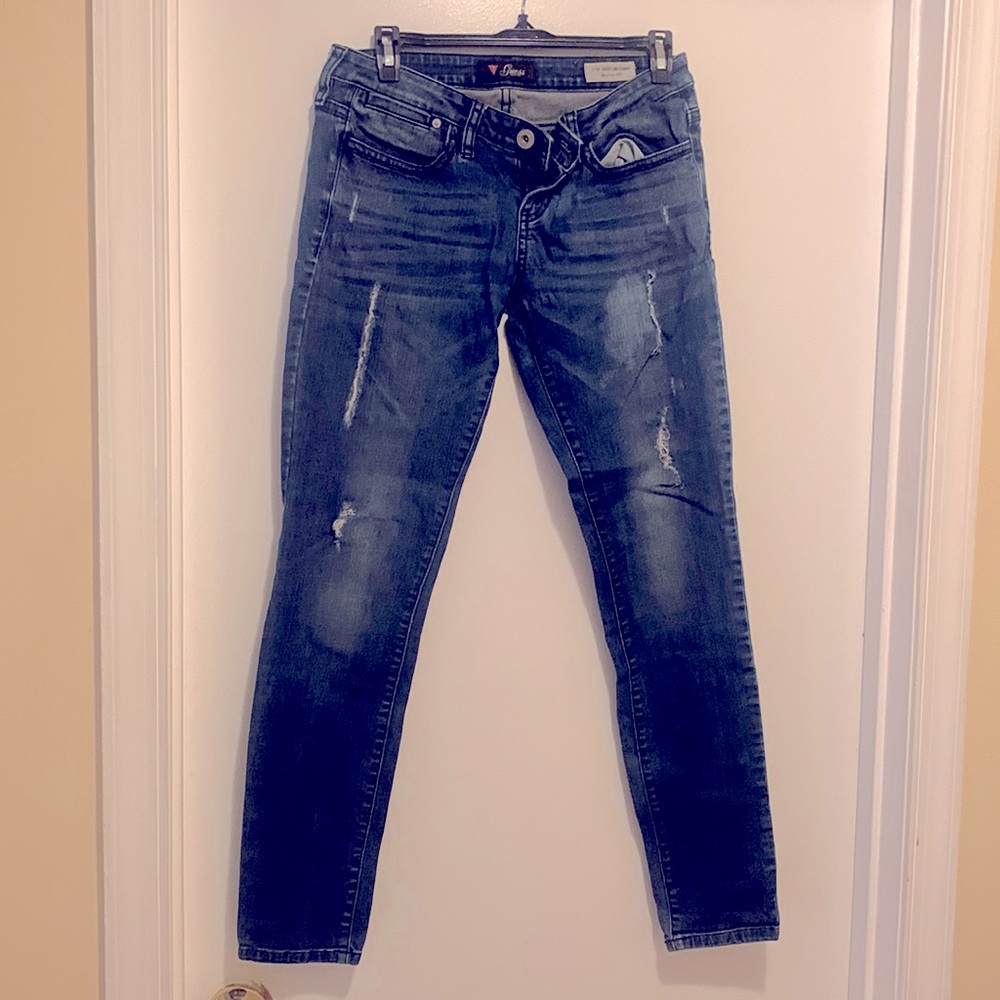 Distressed blue Jeans
